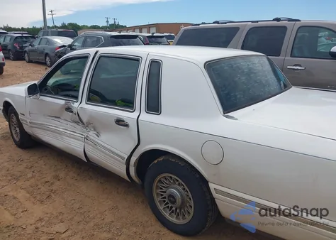 1997 Lincoln Town Car Executive из США, поврежденный, VIN 1LNLM81W7VY702095
